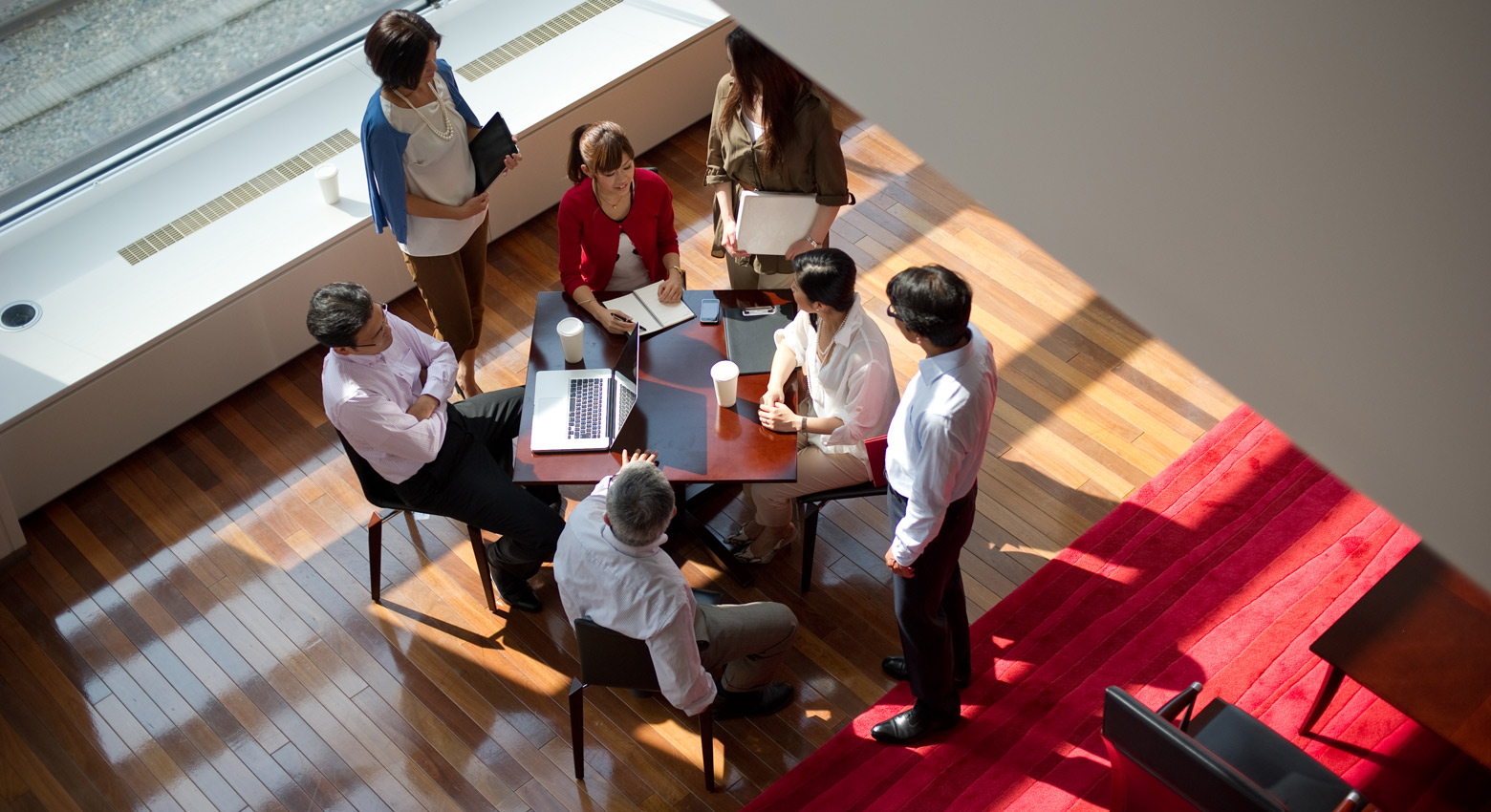 People working at table 