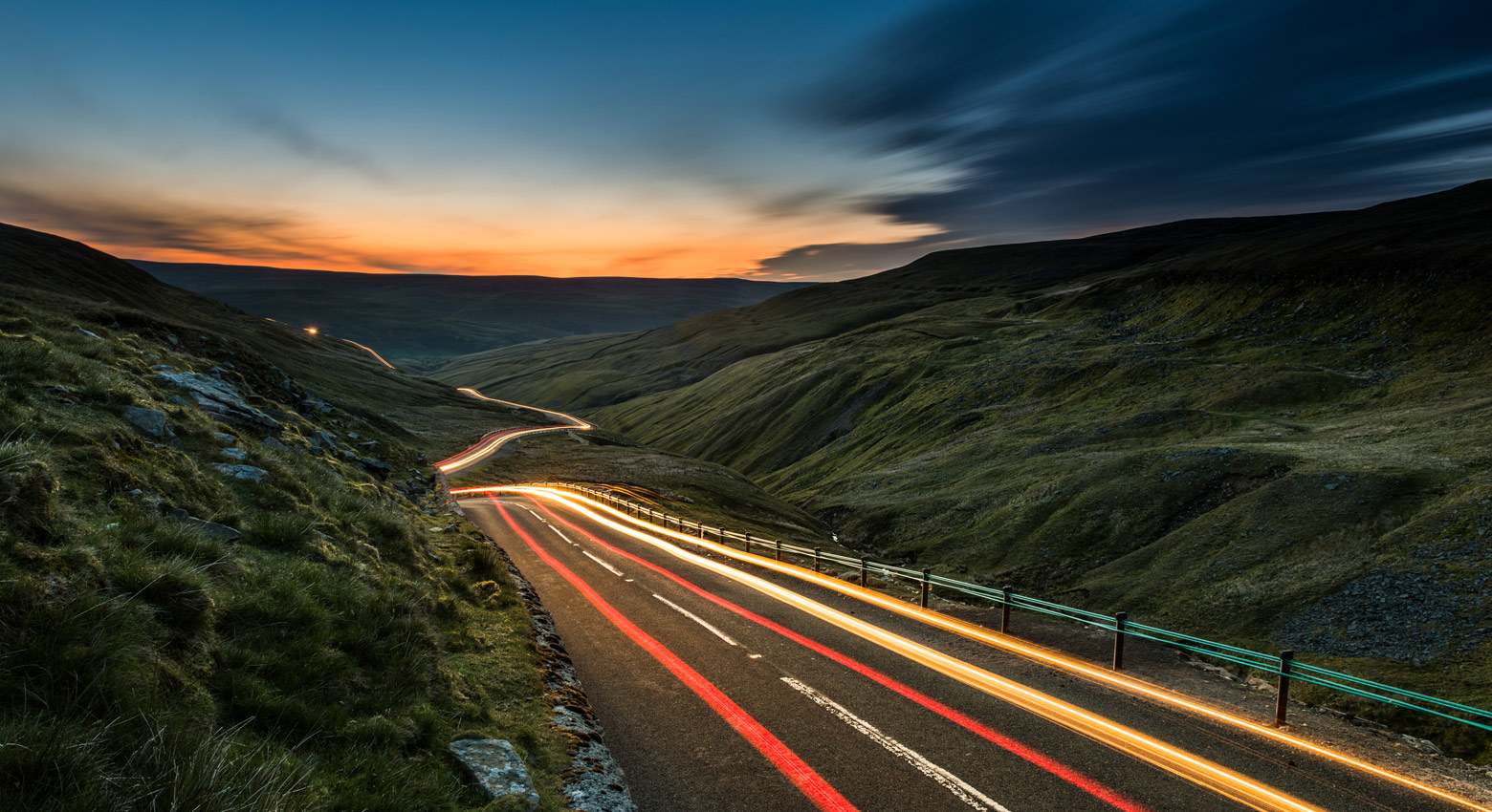 Hills, road, lights and sky 