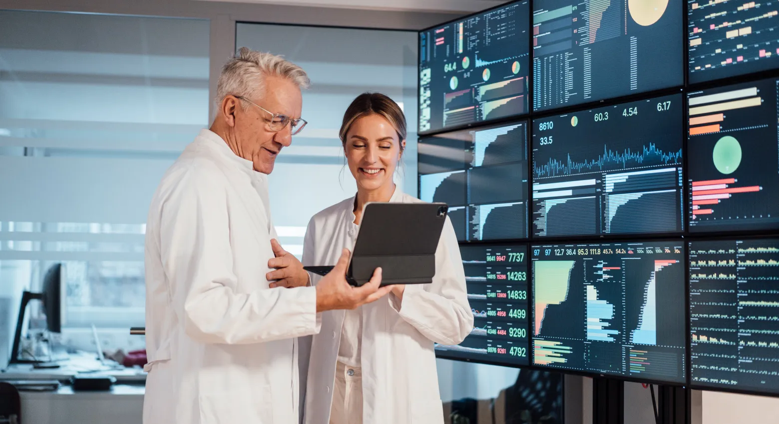 Man and woman with a tablet