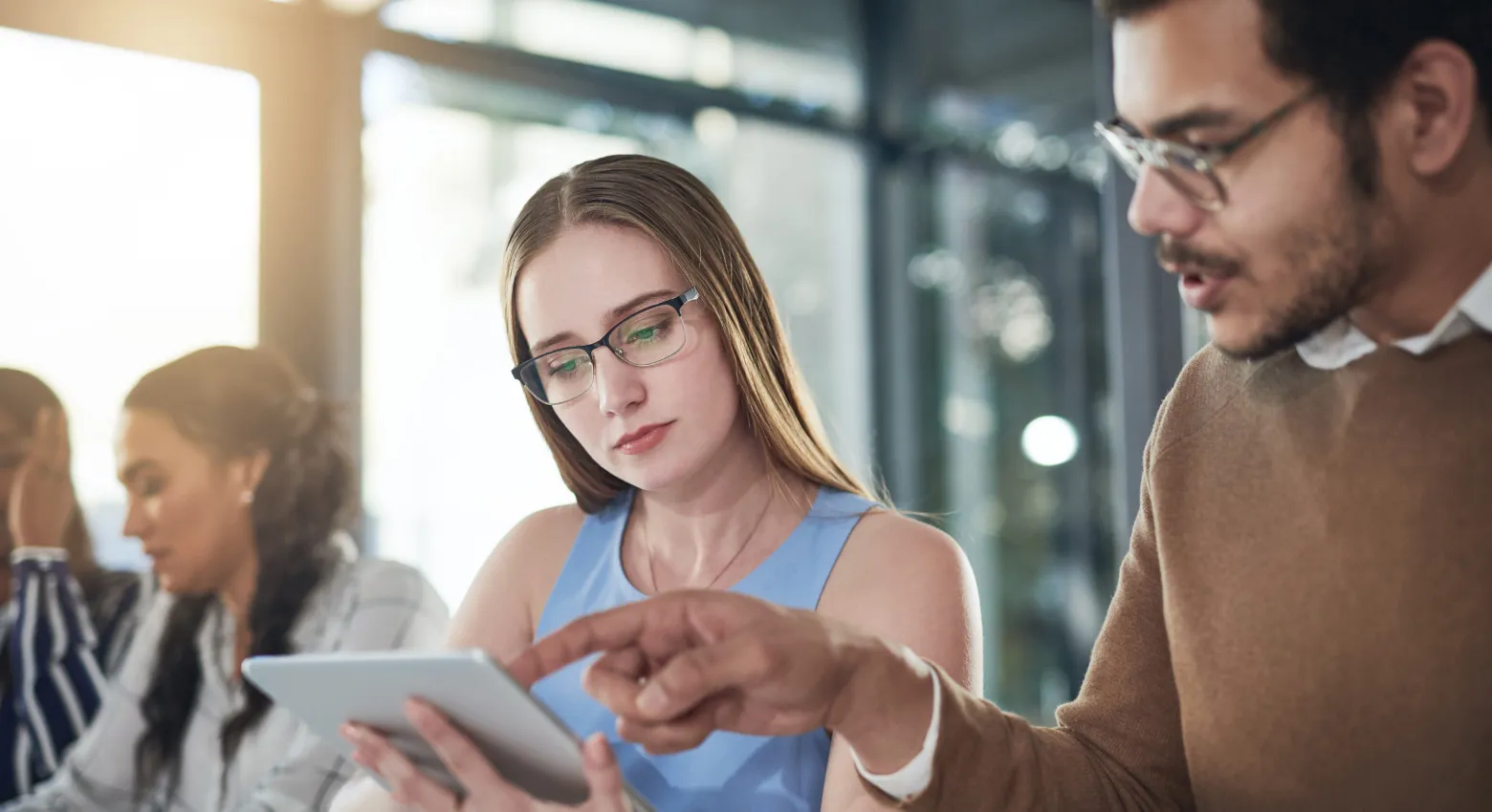woman and man with tablet