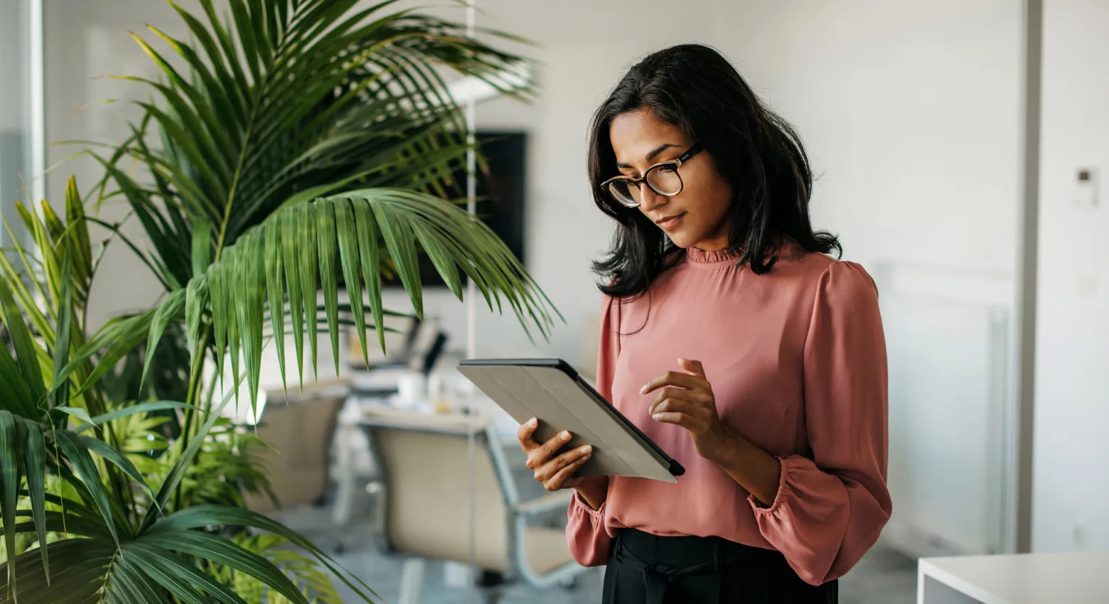 Woman looking at tablet