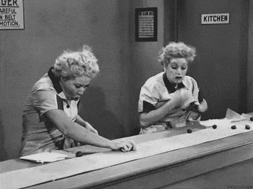 Lucy and Ethel from I love Lucy at the chocolate factory