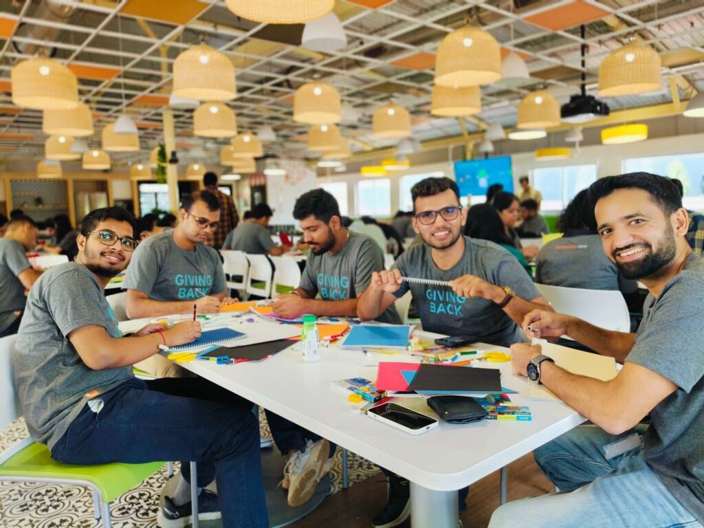 Volunteers sitting at table 