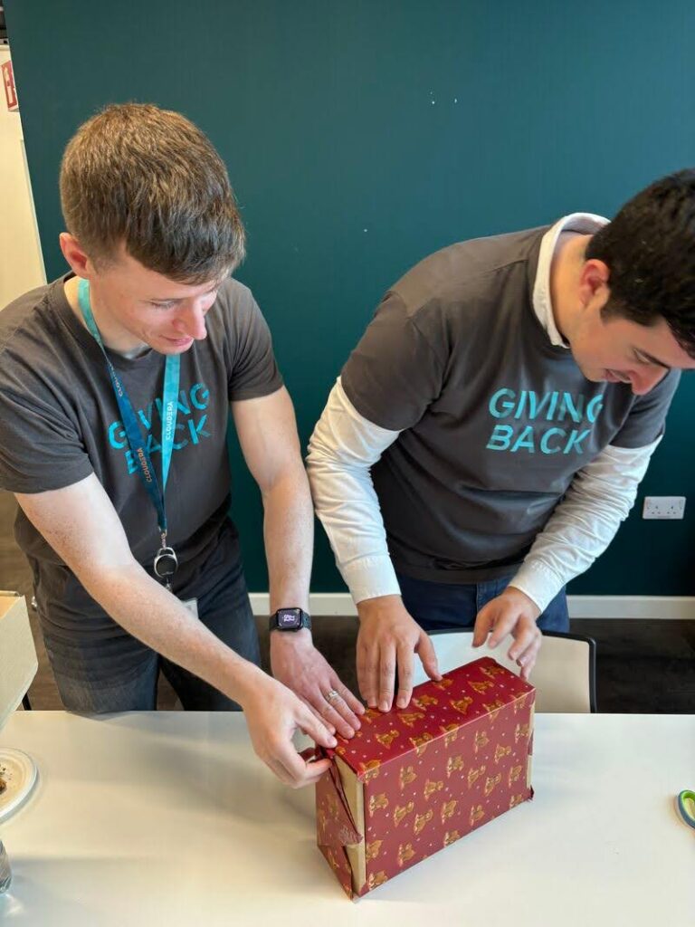 Volunteers wrapping gifts 