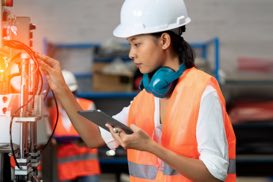 Thumbnail of two people working together at a computer