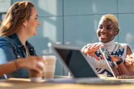 Thumbnail of two people working together at a computer