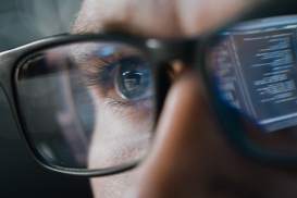 Thumbnail of two people working together at a computer