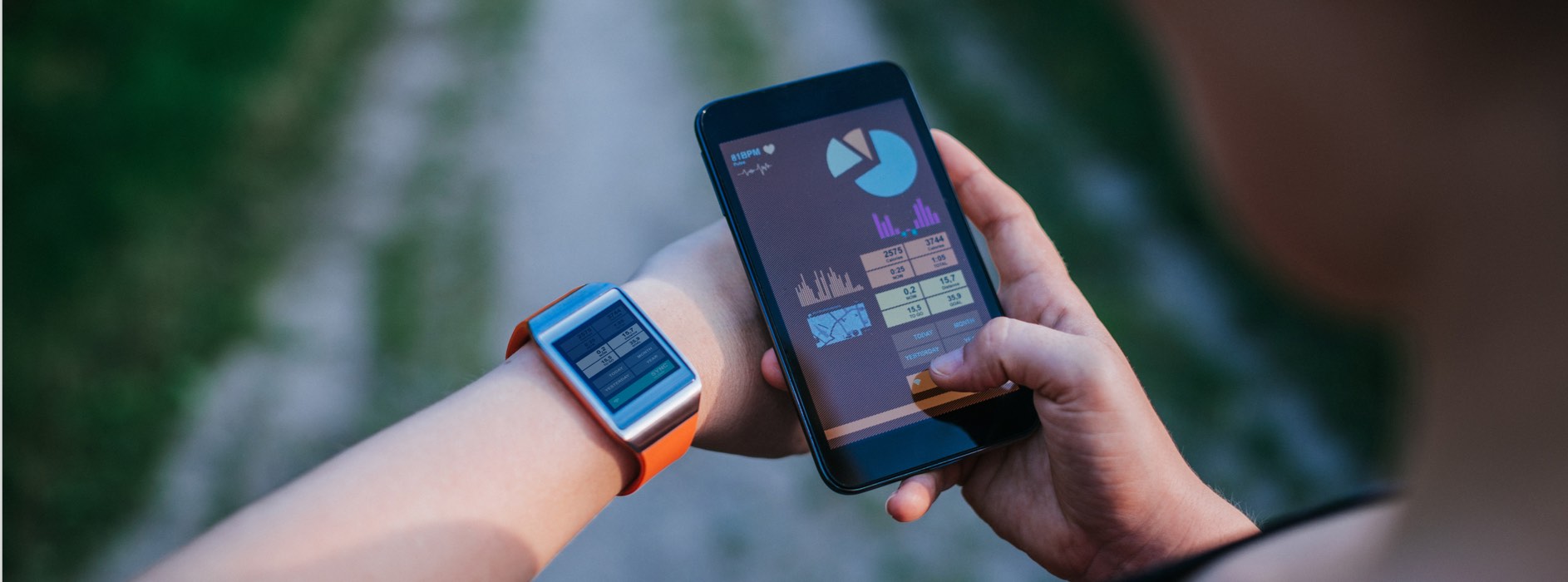 Person using smart phone with smart watch