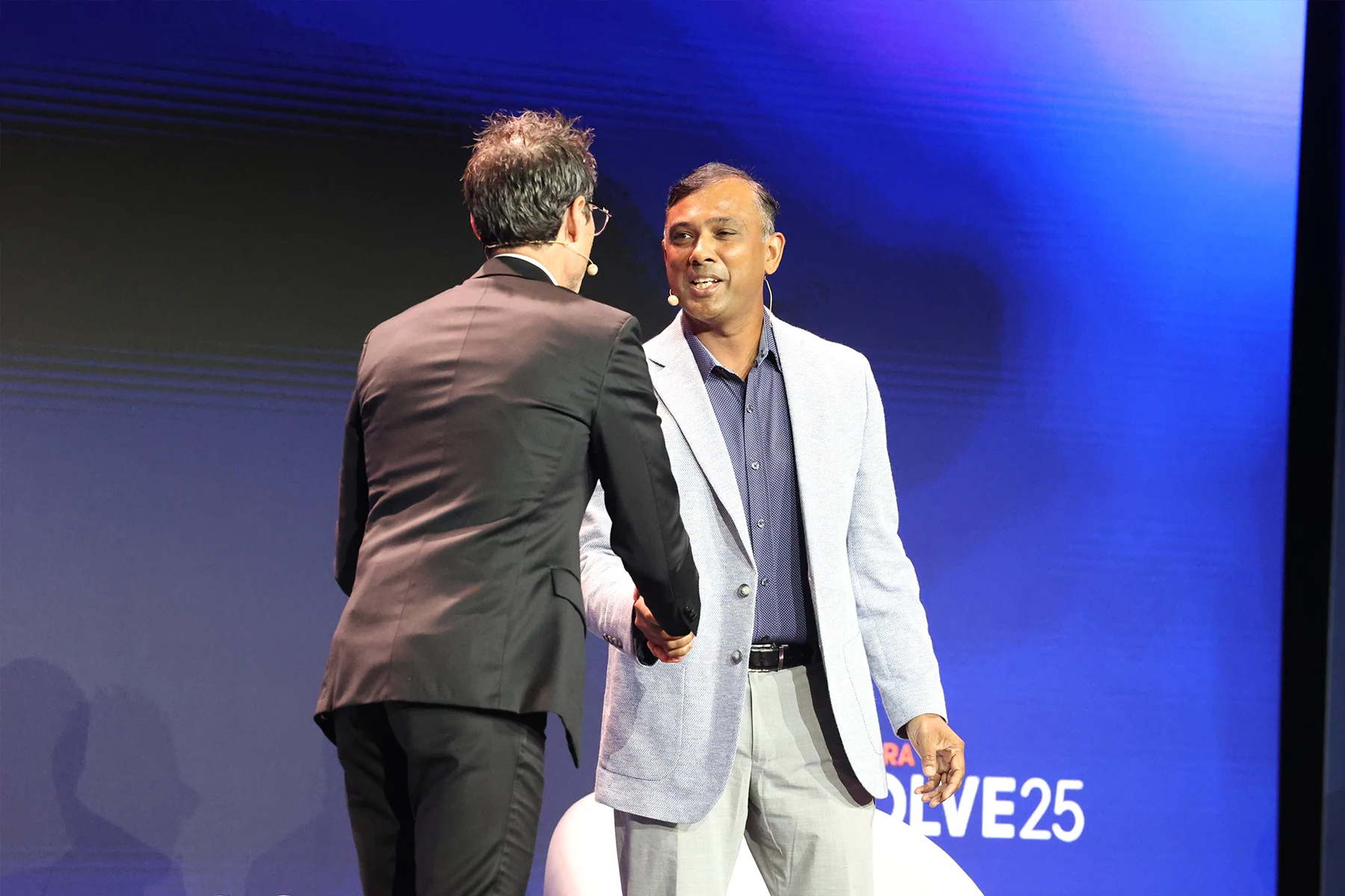 Award winner receiving Data Impact Award in Evolve