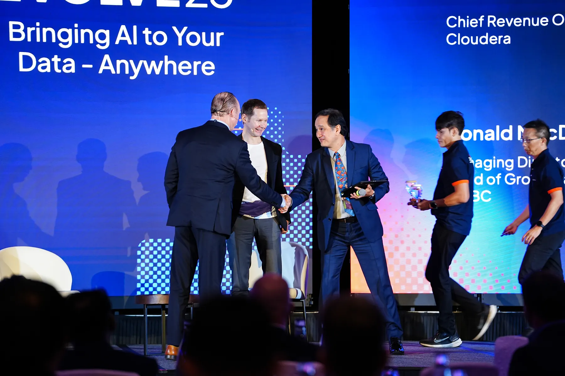 Award winner receiving Data Impact Award at Evolve