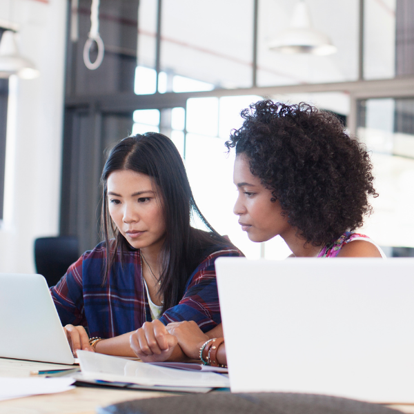 women looking at laptop