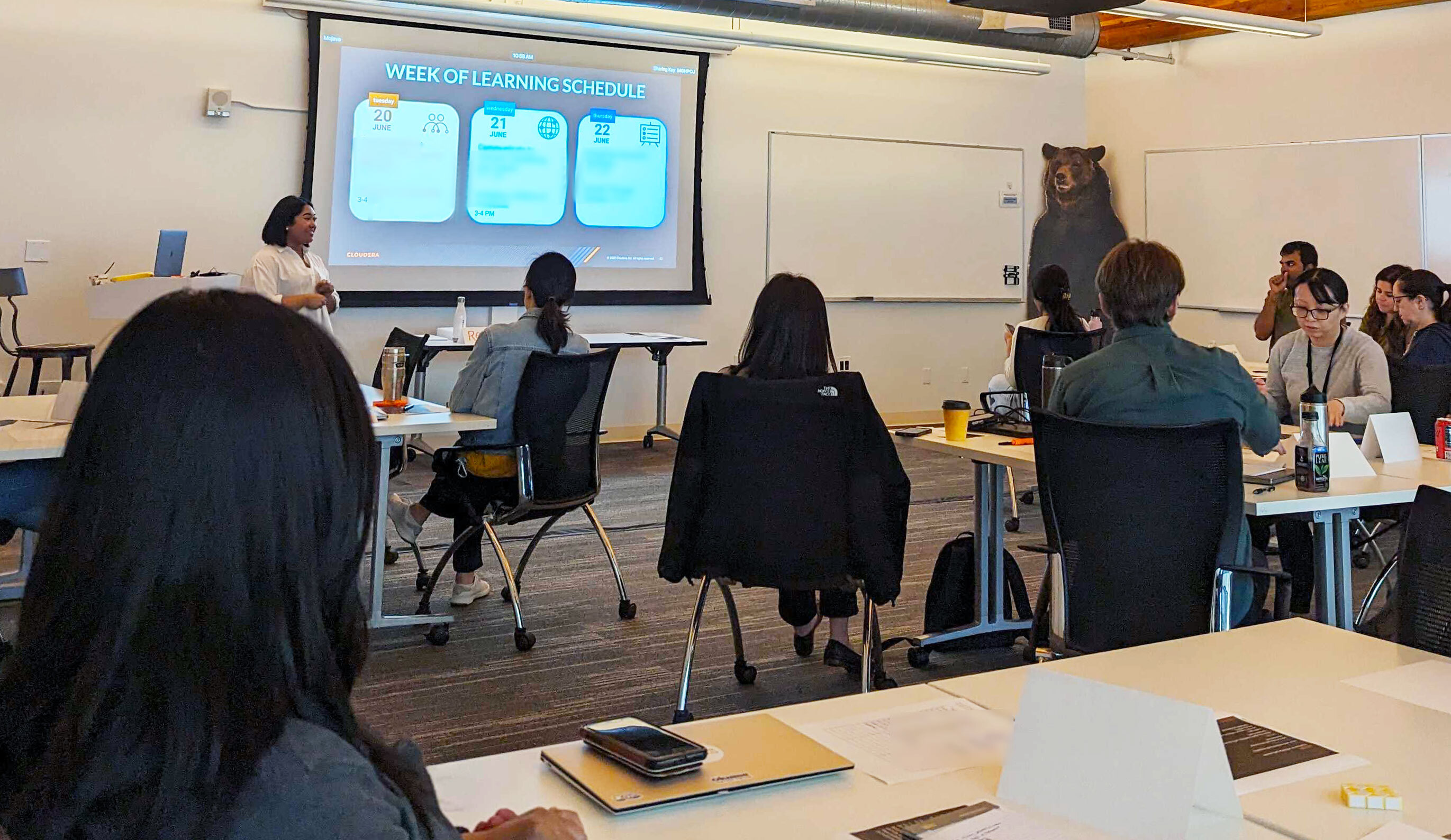 Cloudera employees in a training session